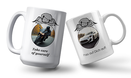 Two white mugs with angel graphics, each showing a motorbike, a car and safety text: “Take care of yourself.”