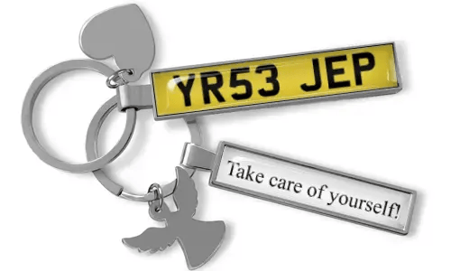 Gepersonaliseerde motor-sleutelhanger met gegraveerd label