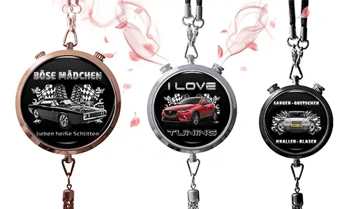 Three round pendants with car themes on black backgrounds. Left: vintage car with German text and checkered flags. Center: red SUV, 