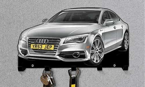Silver Audi-shaped wall key holder with five hooks for organizing keys