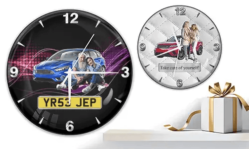Two wall clocks with couples and cars: left with blue car and purple waves, right with red car on quilted white background