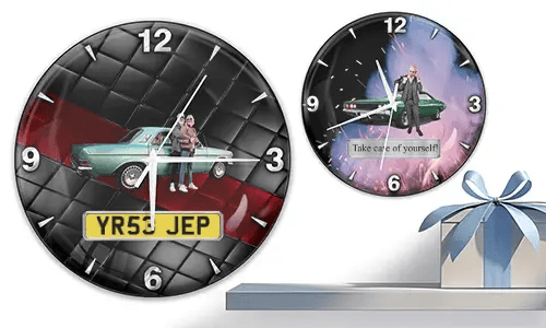 Two wall clocks with vintage cars and figures: left with turquoise car and quilted background, right with green car and fiery cosmic theme