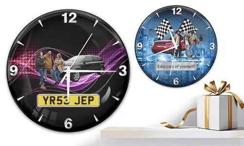 Two wall clocks with group car scenes: left with black car and purple waves, right with red and black cars, racing flags, and blue background